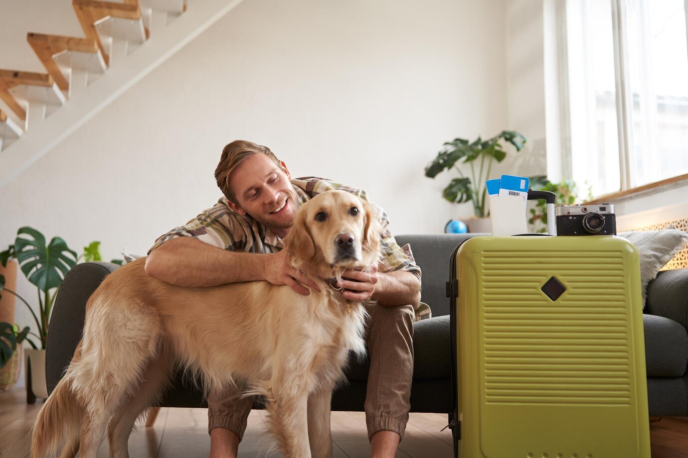 Portrait Young Man Hugging His Dog Going Vacation Petfriendly Hotel Packed Suitcase Sits 1258 270293